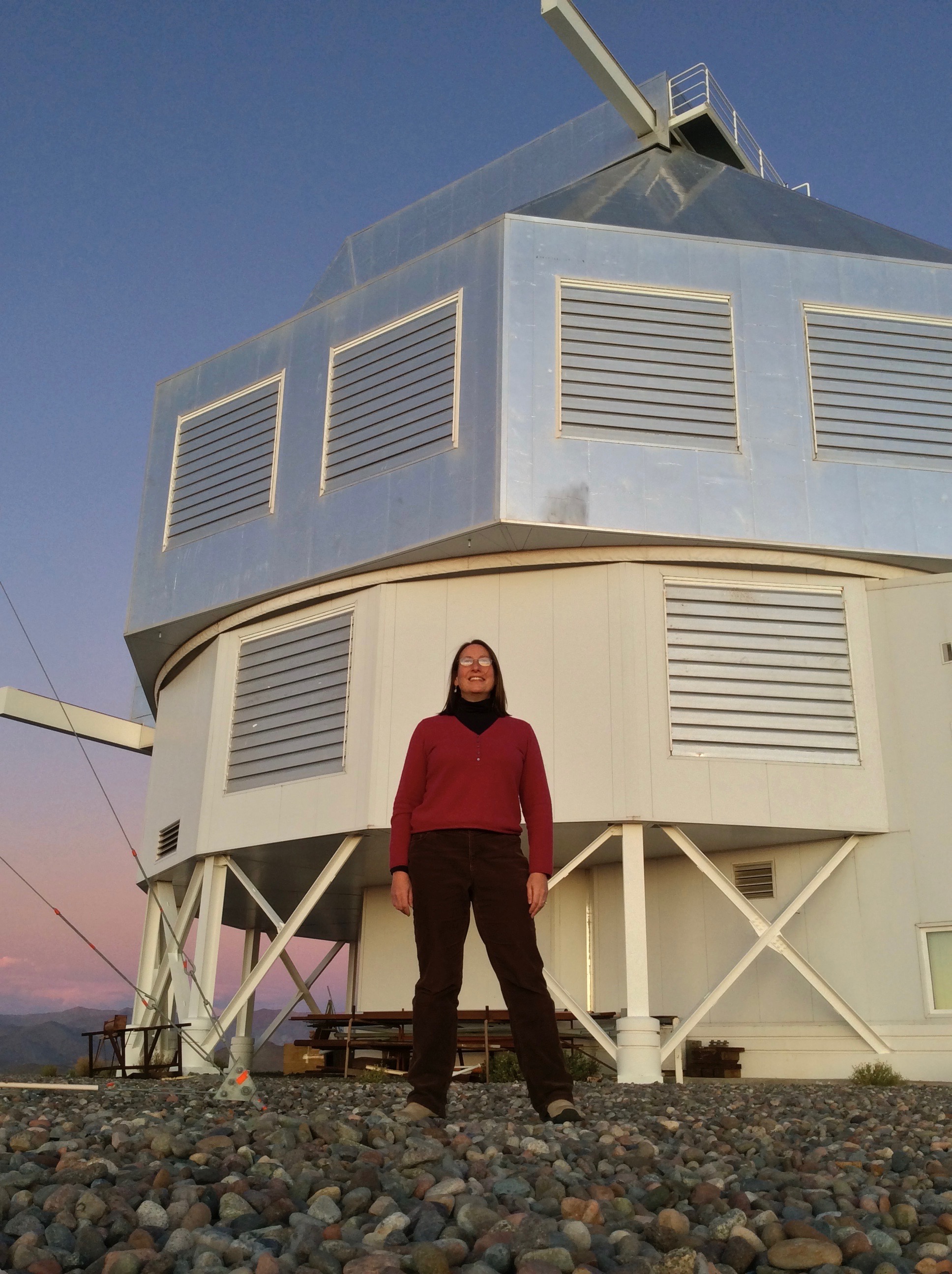 Alycia Weinberger infront of Magellan Telescope