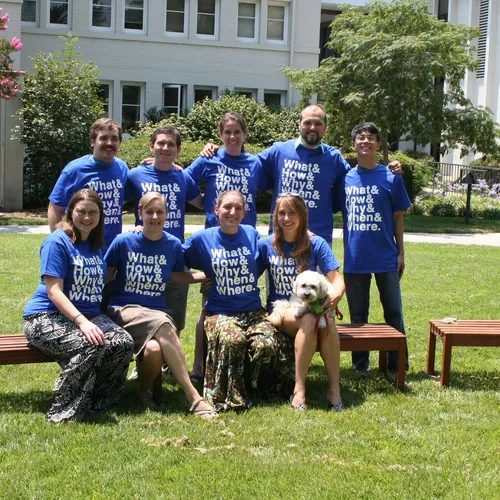 Observatories postdocs pose with dog