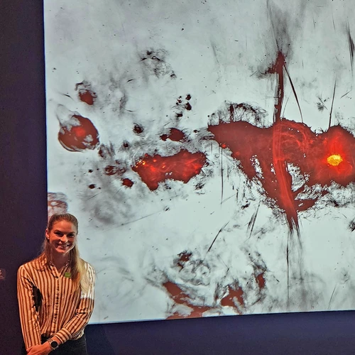 Allison Matthews with the image from the MeerKAT radio telescope.